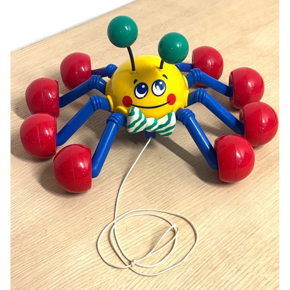 Vintage 1999 Tomy Pull Along Spider Toy Yellow Blue Red Rolling Wheels Bow Tie